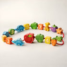 Colorful wooden beads for threading and fine motor skill practice