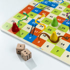 Family board game set with wooden dice and cone-shaped pieces