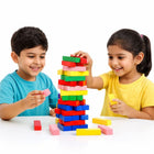 Vibrant wooden block tower game with red and pink dice